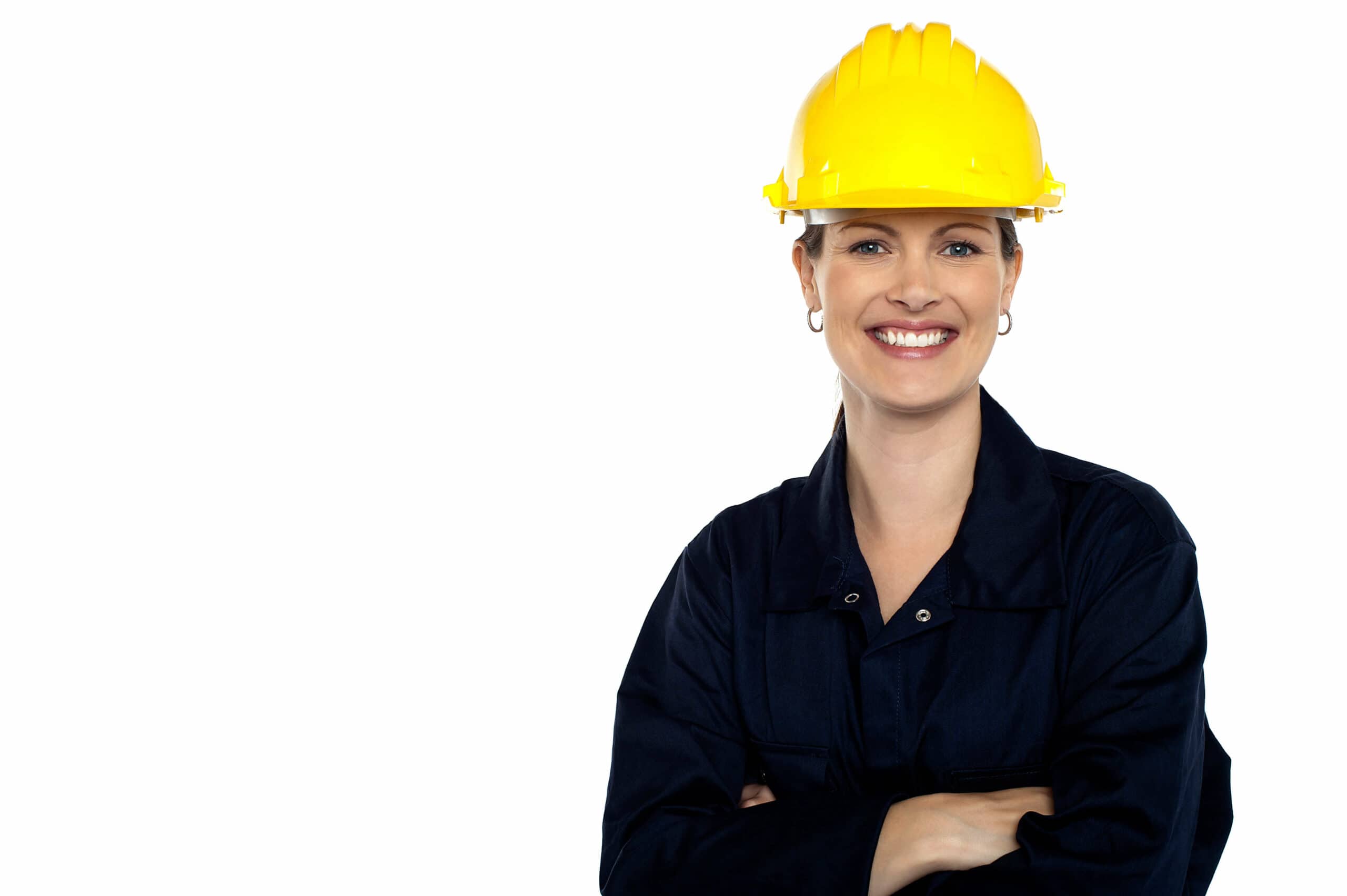 Beaming construction worker wearing yellow safety helmet. Cheerful portrait