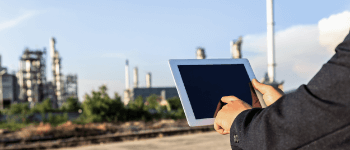 Man using his tablet to discuss safety training options